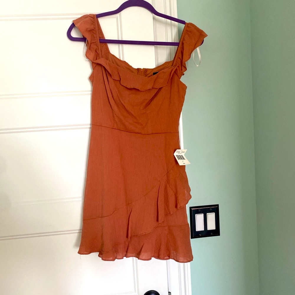 Beautiful dress, new with tags! Brand is B Smart.